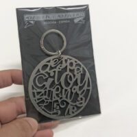 Stainless steel key ring 'Slowly and Well' with matte finish, inspired by Antonio Machado, designed by Lucía Huertas, made in Spain.